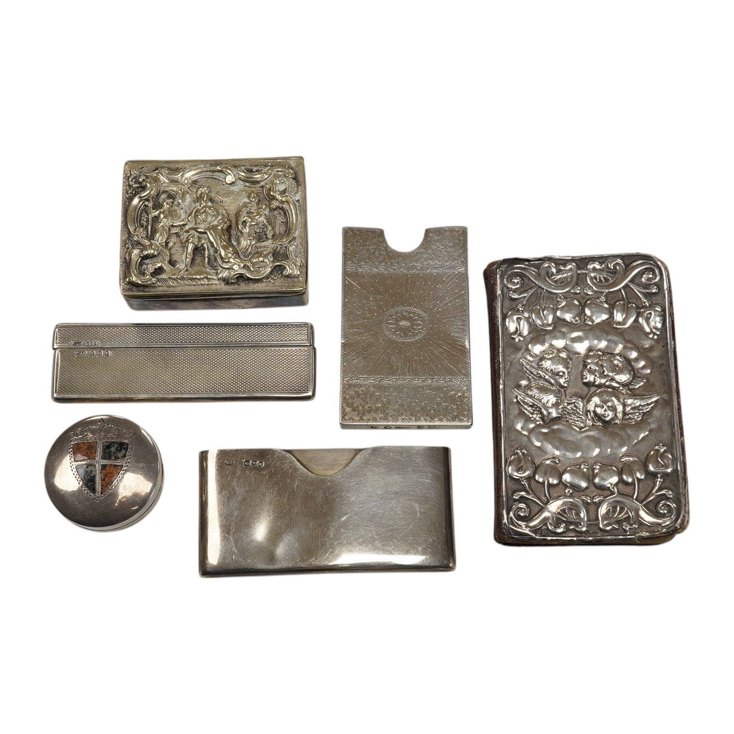 Assorted small silver including an Edwardian inset Scottish hardstone pill box, William Henry Johnson, Birmingham, 1902, 36mm, a mounted prayer book, a card case, cased comb and a plated snuff box. Condition - poor to fa